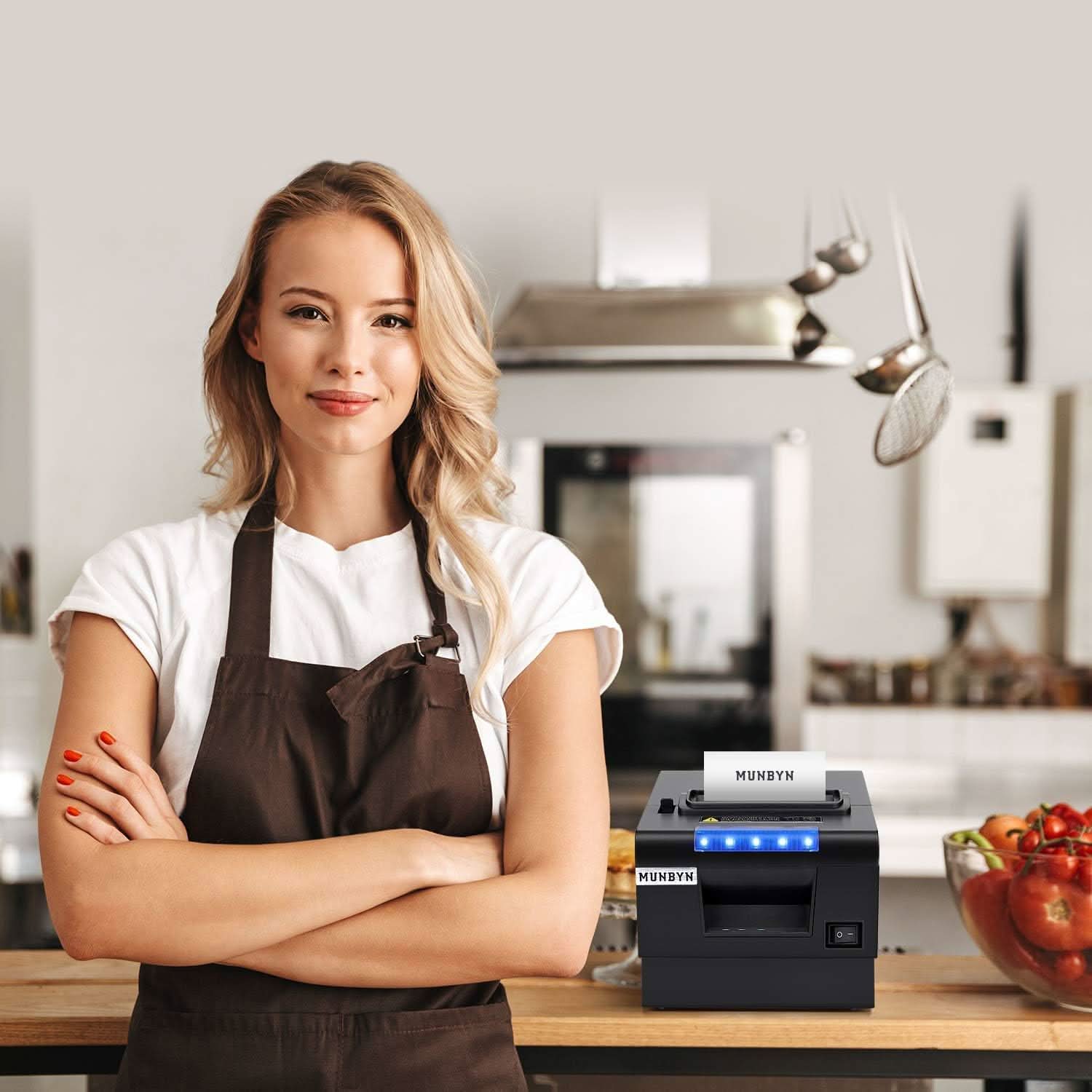 MUNBYN P068 receipt printer with compact design and paper roll, ideal for retail and hospitality point-of-sale transactions.