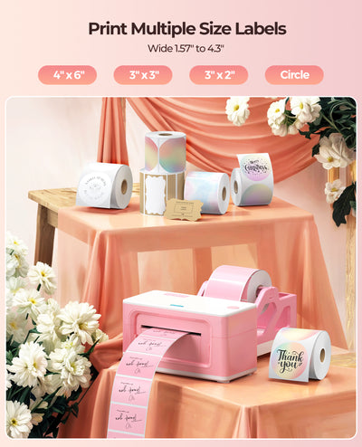 Label printer with rolls of labels on a table
