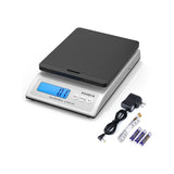 MUNBYN IPS01 postal scale used as label printer accessory, showing digital display and compact design for accurate weight measurement.