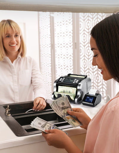 MUNBYN P01 thermal receipt printer with paper roll, compact design, and easy-loading mechanism for efficient printing.