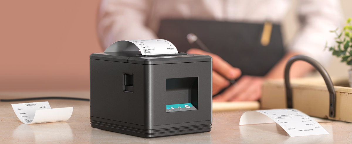 MUNBYN P098 receipt printer at a checkout counter